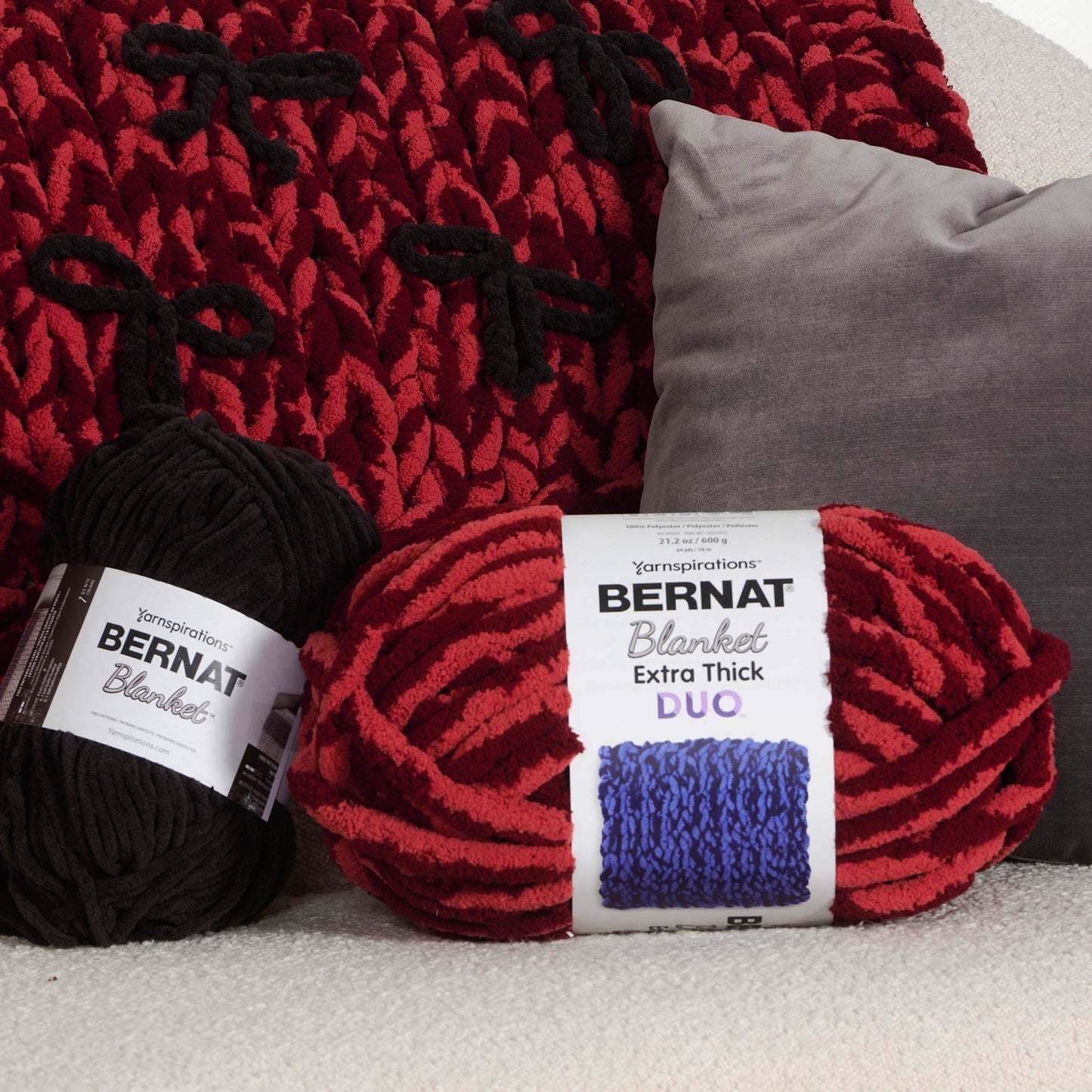 Bernat Put a Bow on it Table Knit Blanket